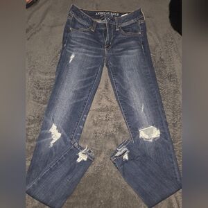American Eagle Outfitters Dark Blue Distressed Skinny Super LOW cut Jeggins